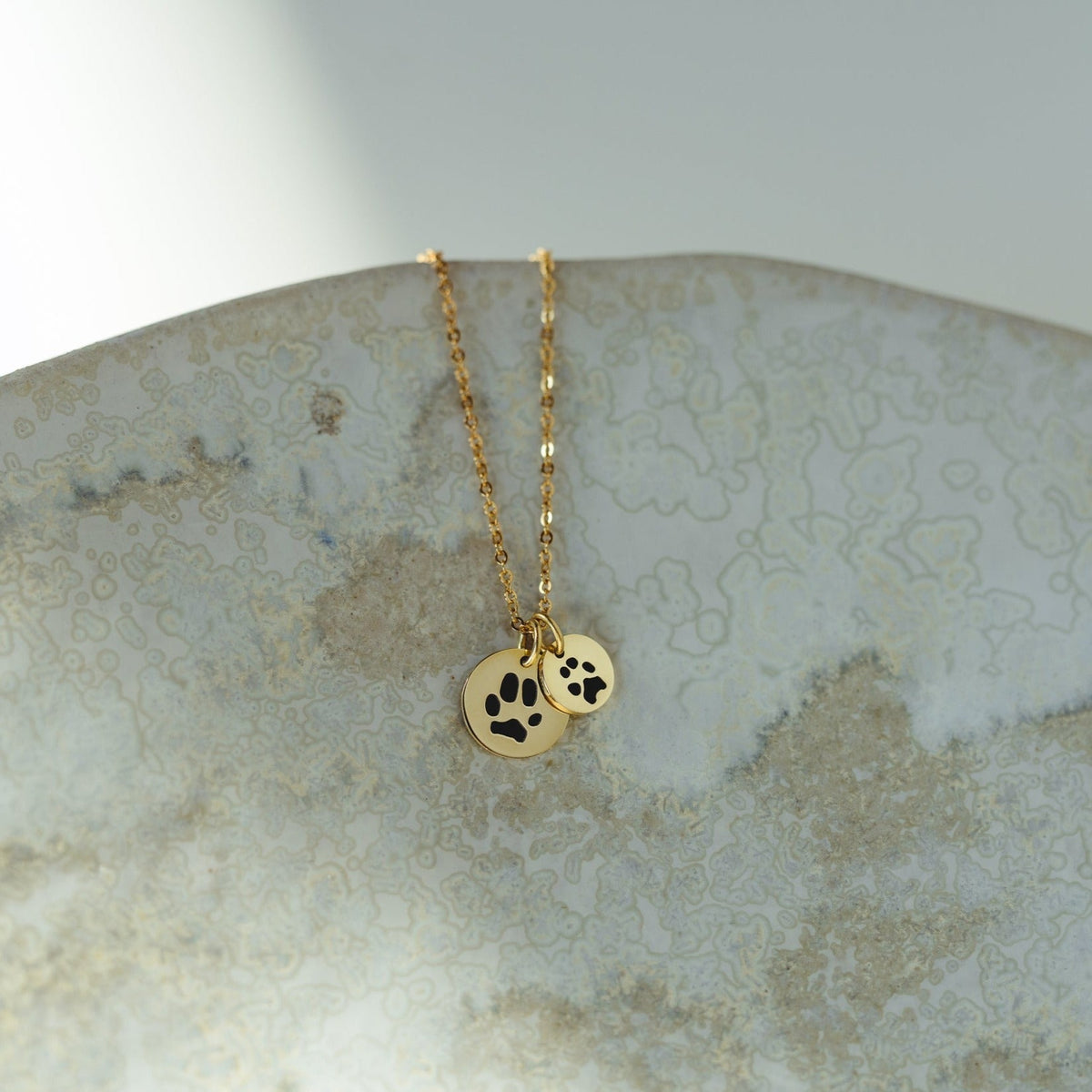 Paw print pendant gold hotsell